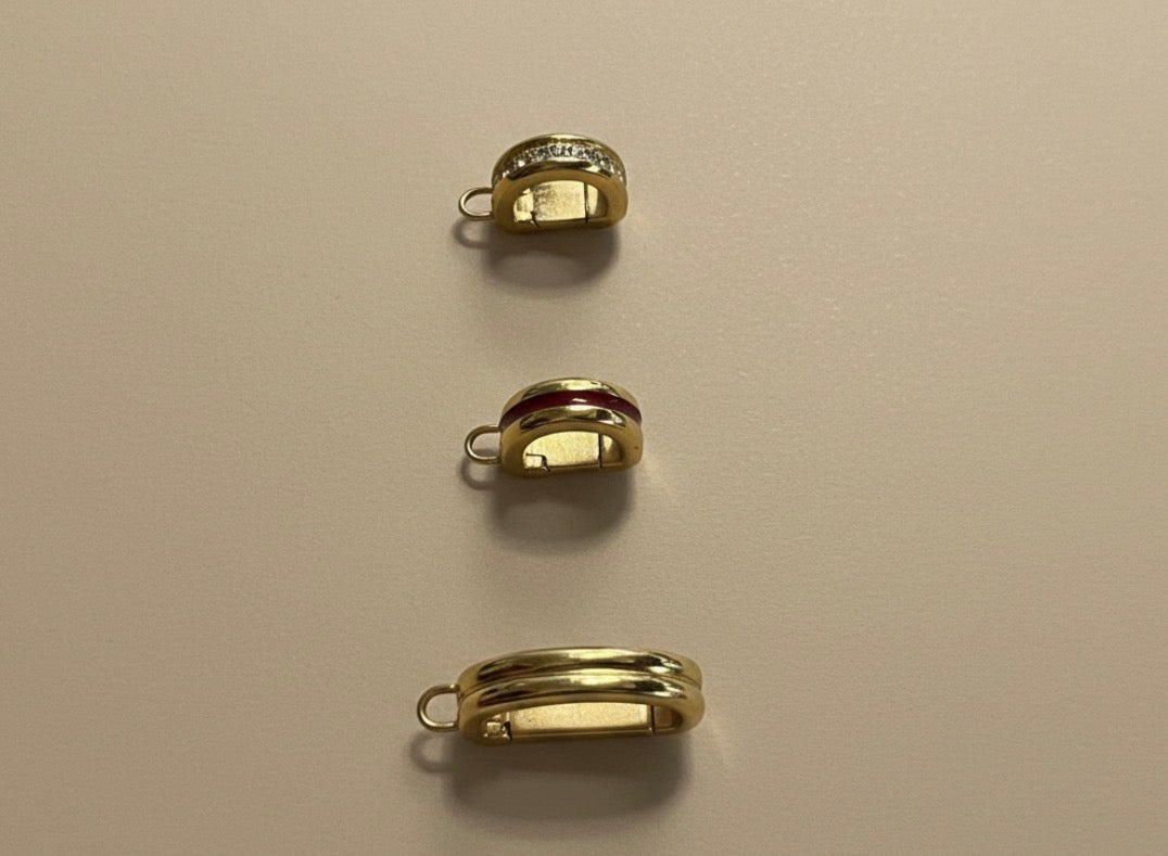 Three bikini clip on a beige background