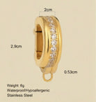 Gold hoop bikini clip on  with embedded stones, shown with measurements and product details on a beige background.